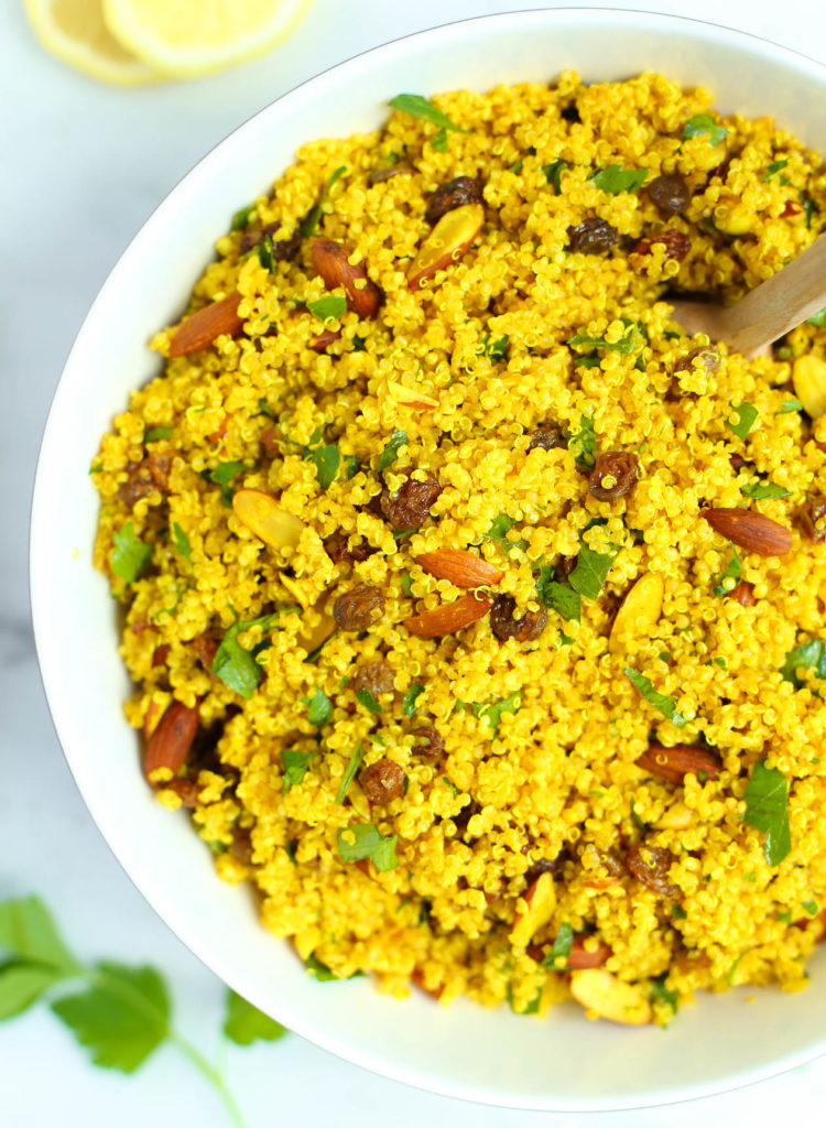 Healthy golden quinoa salad with curry turmeric spice